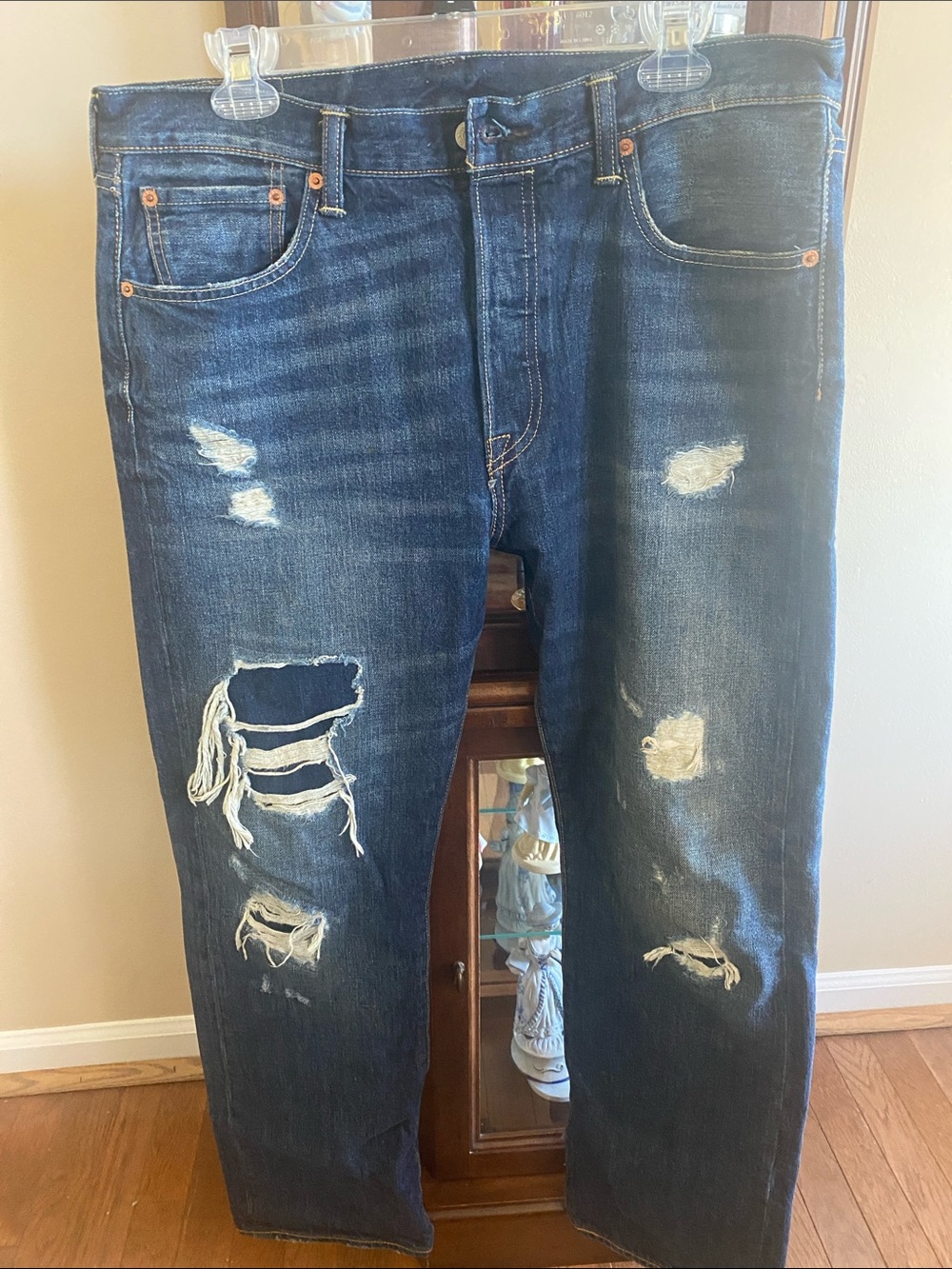 #17.  Levi's Dark Blue Distressed Relaxed Jeans #17